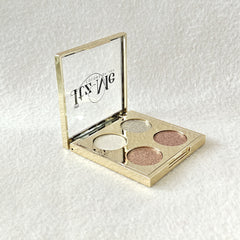 Hand holding Itz Me Shimmer Palette Shade 01 showing 4 metallic glitter colors in sleek packaging