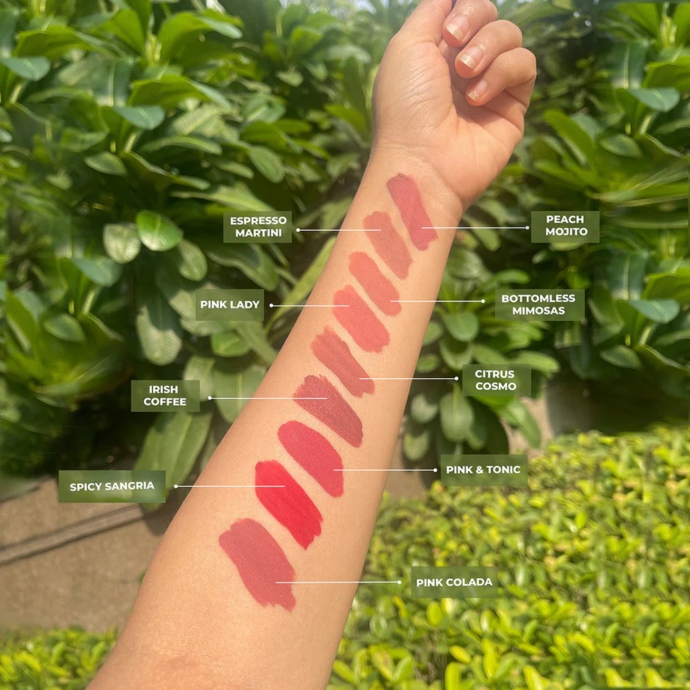 Swatches of Love Earth Liquid Mousse Lipstick on arm showing color names